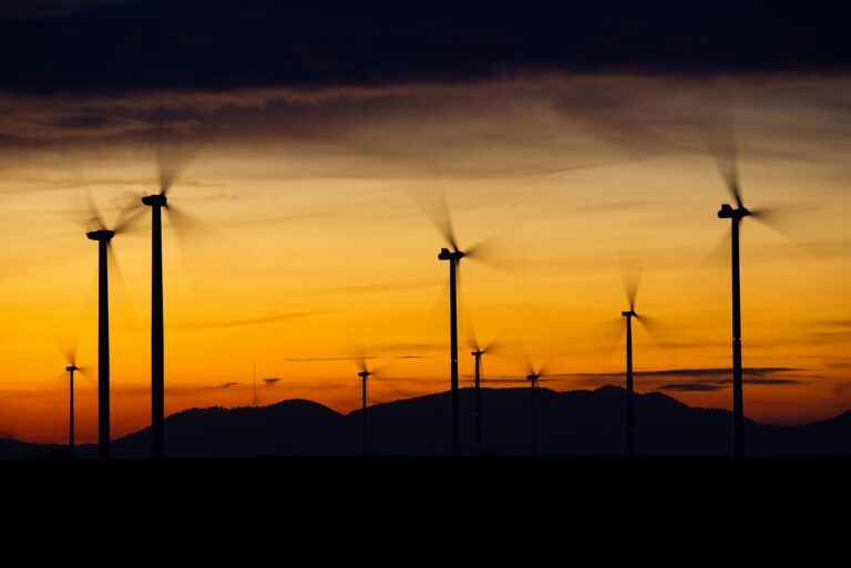 wind turbines, silhouettes, sunset, blue sky, dusk, twilight, renewable energy, wind power, energy, blue, environmental technology, rotor, power generation, nature, wind energy, power supply, landscape, rotor blades, propellers, sky, afterglow, wind park