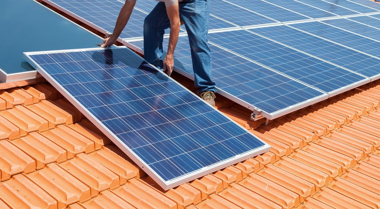 solar panel, roof, installation, renewable energy, solar energy, ecology, sustainability, solar technology, energy efficiency, photovoltaics, worker, roof tile, clay color, outdoor, technology, maintenance, workwear, panel, industry, roof work