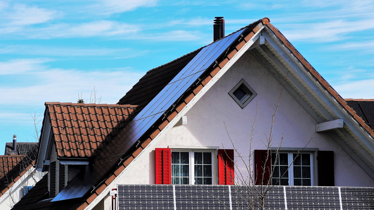 the roof of the, house, the window, shutters, red, architecture, sky, family, blue sky, building, no one, outside, the structure of the, modern, on the roof, under the roof, roof plate, roofing, window, covering, building and construction, small building, village, wooden window, nature, style, aesthetically pleasing, solar panels, solar batteries